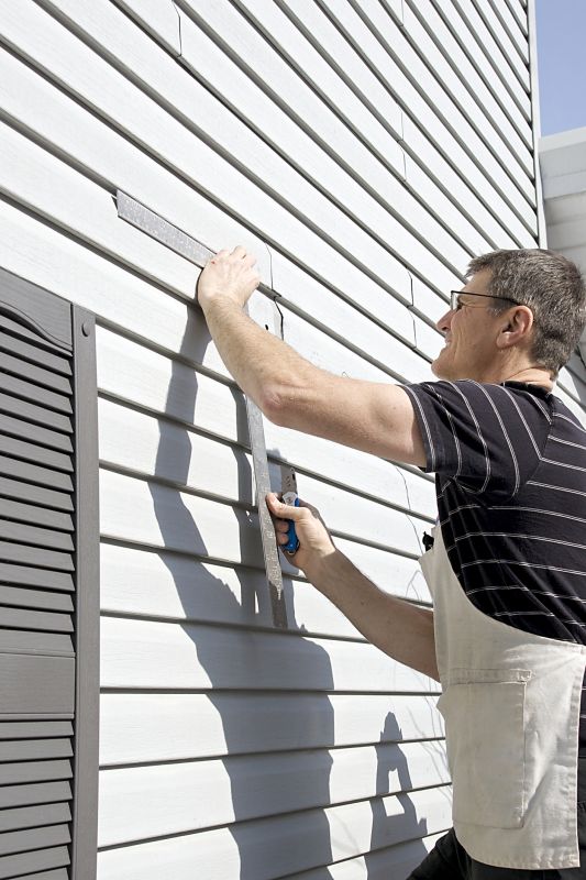Exterior siding being installed on a house